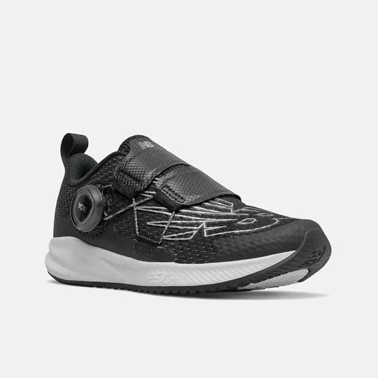 Kid's athletic shoe in black and white