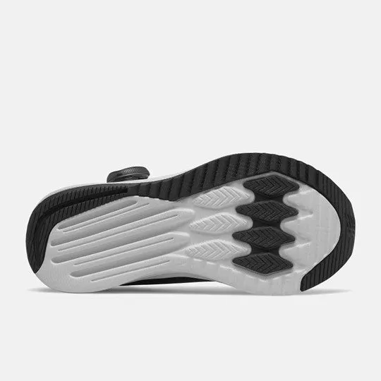 Kid's athletic shoe in black and white